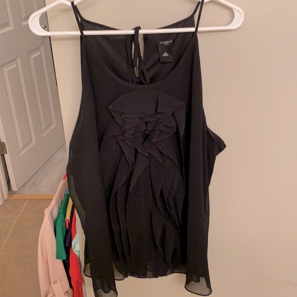 Black sleeveless ruffle blouse